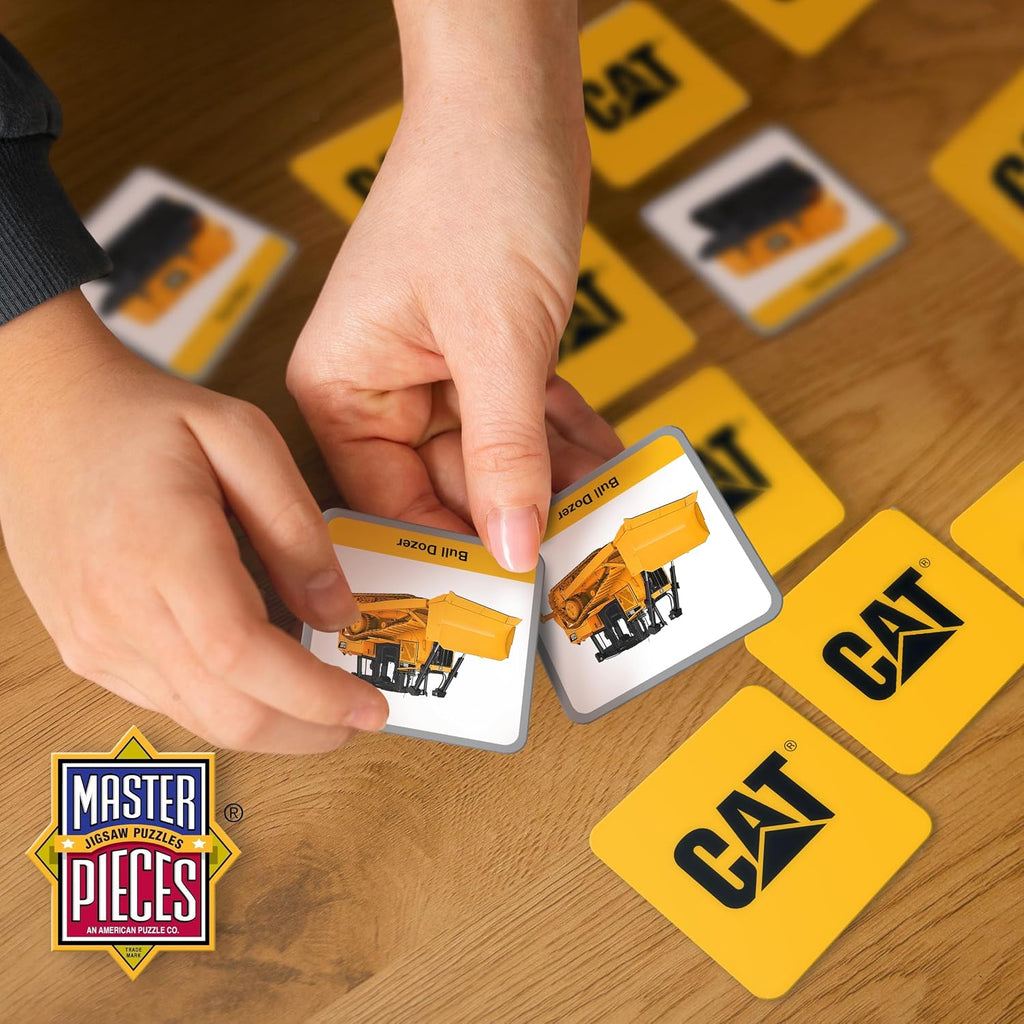 Kids playing the CAT matching game with bulldozer cards